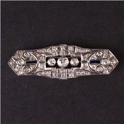 Vintage sterling silver brooch with diamonds and synthetic saphires