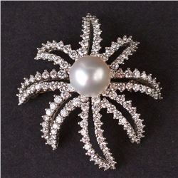 "Tiffany& Co" Brooch Fireworks serie in Platinum with Pearl and Diamonds