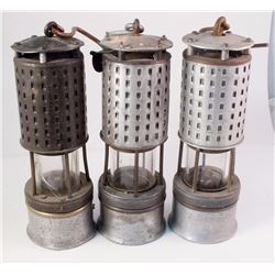 Three Mining Safety Lamps