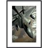 Image 1 : A U.S. Air Force F-22 Raptor is refueled by a KC-10A Extender aircraft over southwest Asia. framed b