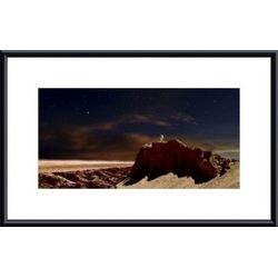 Artist's depiction of a lone astronaut on another planet framed black metal white matte