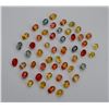 Image 1 : Fancy Multi Color Oval & Pear Sapphire 10 cts plus