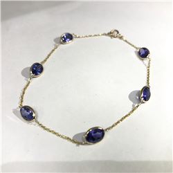 #19-14K YELLOW GOLD TANZANITE BRACELET