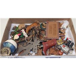 COLLECTION OF 32 METAL COWBOY THEMED