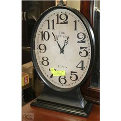 "THE NEW ERA "OVAL METAL PEDESTAL CLOCK W/CAST