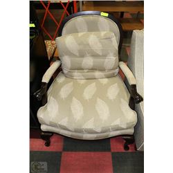 WOOD AND FABRIC LEAF PATTERN ARMCHAIR