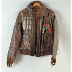 PAINTED LEATHER A 2 FLYING JACKET WORN BY T/SGT JOSEPH R. RODRIGIUEZ, RADIO OPERATOR-GUNNER, MEDALS 