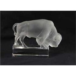 A SIGNED LALIQUE BUFFALO PAPERWEIGHT