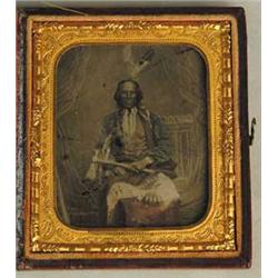 RARE TINTYPE OF INDIAN BRAVE WITH TOMAHAWK