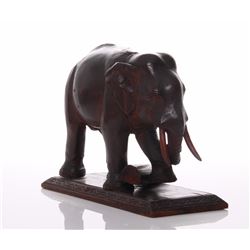 Antique wood carved Elephant lifting a log, In