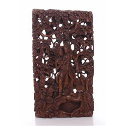 Indonesian pierced relief wood panel carving.