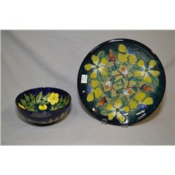 Two pieces of Moorcroft pottery including Buttercup bowl and 10  diameter Hypericum plate