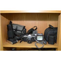 Two shelf lots of vintage cameras and camera equipment including Pentax, Gold star VHS movie camera,