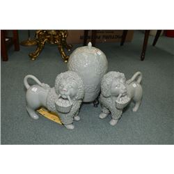 Three pieces of Maitland-Smith Ltd. glazed pottery including a pair of celadon foo-dogs and a celado