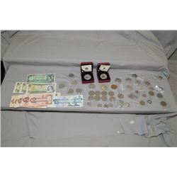 Large selection of Canadian coins and paper money including  Pre-historic Creatures  25cent pieces, 