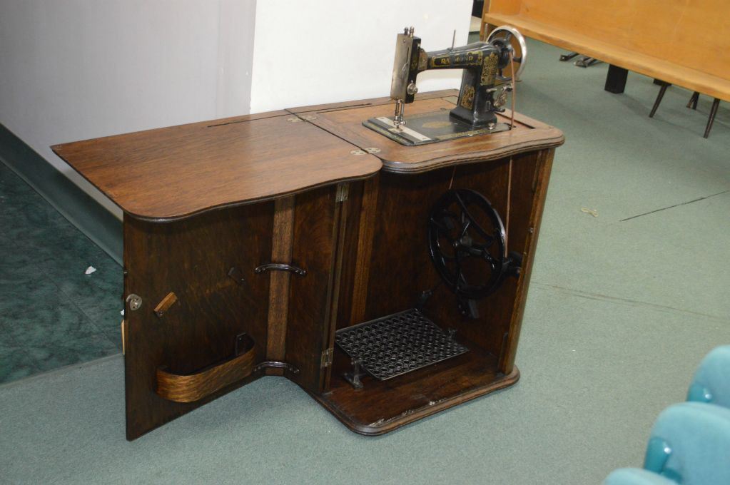 Raymond Treadle Sewing In A Fold Over Pull Up Quarter Cut Oak Cabinet