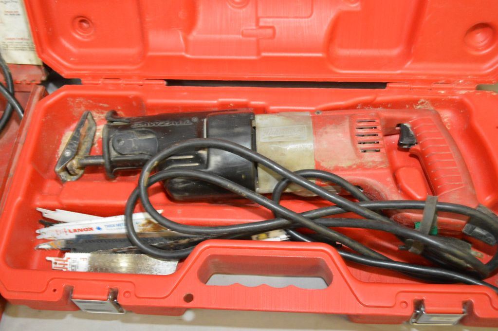 Heavy duty Milwaukee corded sawzall in original case and a Milwaukee 1