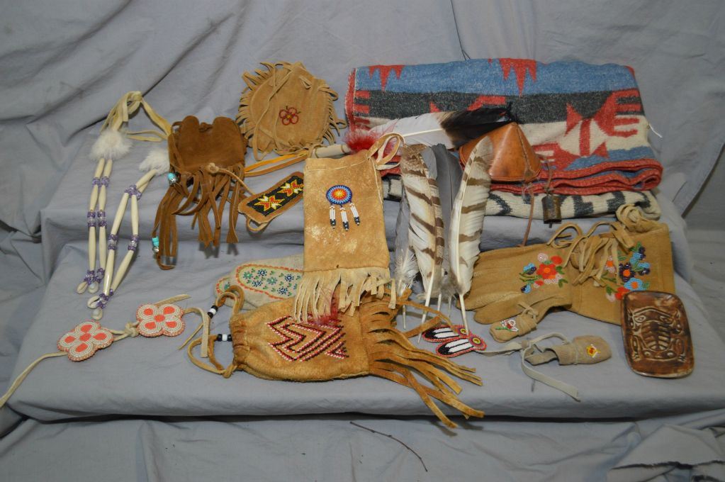 Selection of First Nations handcrafted items including beaded gloves ...