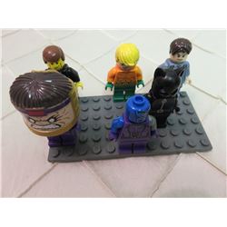 Lego Minifigures Bruce Wayne, Aquaman, Catwoman, and Others
