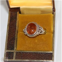 STERLING SILVER WITH AMBER CENTER SIZE 7.5