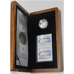 21) RCM POLAR BEAR $2 FINE SILVER AND STAMP SET