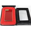Image 1 : A PAIR OF LIGHTERS – ZIPPO AND ST. JACQUES