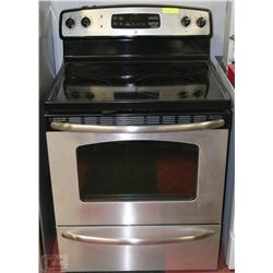 GENERAL ELECTRIC CERAMIC TOP STOVE WITH  SELF
