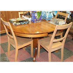 ROUND TABLE WITH FOUR CHAIRS AND LEAF