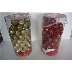 TWO TUBES OF RED AND GOLD CHRISTMAS ORNAMENTS