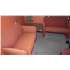 Image 1 : TWO RED LOVESEATS AND COFFEE TABLE