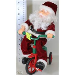 TRICYCLE RIDING SANTA
