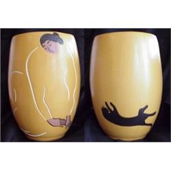 R. C. Gorman (b. 1931) American, WOMAN WITH BLACK CAT, 1981, yellow ceramic vase, numbered edit...