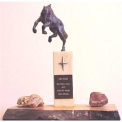 Western sculpture: John Wayne's award, THE MUSTANG AWARD for best Western actor, 1973, awarded...