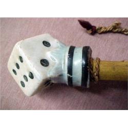 Wooden walking stick, with porcelain die handle,