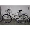 Image 2 : 2 BIKES: BLACK RALEIGH MOUNTAIN BIKE & BLUE NO NAME HYBRID BIKE