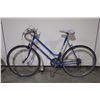 Image 2 : 2 BIKES: RED NORCO FRONT SUSPENSION MOUNTAIN BIKE & BLUE APOLLO TOUR BIKE