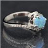 Image 2 : Sterling and Synthetic Blue Opal Bypass Ring