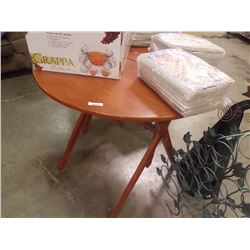 ROUND PORTABLE FOLDING TABLE