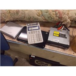 SHARP CALCULATOR &  2 MOVIE PLAYERS & CAR STEREO