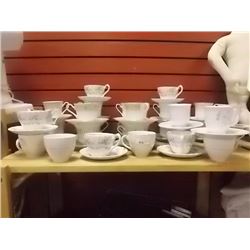 TEA CUPS AND SAUCERS
