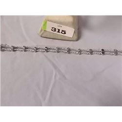 BRACELET - 24 ROUND FACETTED ASSORTED GEMSTONES & DIAMONDS IN STERLING SILVER SETTING - RETAIL ESTIM