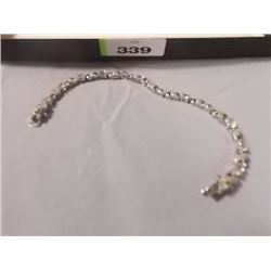 BRACELET - 12 OVAL FACETTED WHITE TOPAZ & DIAMONDS IN STERLING SILVER LINK DESIGN - RETAIL ESTIMATE 
