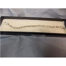 BRACELET - 12 OVAL FACETTED WHITE TOPAZ & DIAMONDS IN STERLING SILVER LINK DESIGN - RETAIL ESTIMATE 