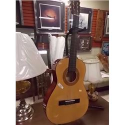 ODYSSEY ACOUSTIC GUITAR - STAND NOT INCLUDED