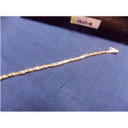 BRACELET - 5 GENUINE DIAMONDS IN STERLING SILVER SETTING - STERLING SILVER FASHIONED IN HUGS AND KIS