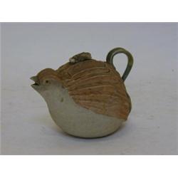 A BANKO TEAPOT, late 19th Century, modelled as a quail, height 10cm  40-60...