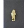 Image 1 : AN IVORY NETSUKE, one eyed monster with snake, signed on leg, height 7cm  50-80...