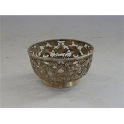AN ORIENTAL METAL CUP SLEEVE, openwork dragons and pearls, marks to base, diameter 8cm  30-40...