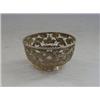 Image 1 : AN ORIENTAL METAL CUP SLEEVE, openwork dragons and pearls, marks to base, diameter 8cm  30-40...