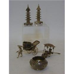 A PAIR OF NOVELTY WHITE METAL PEPPERS, pagoda shapes, a rickshaw boy salt, a palanquin and circul...
